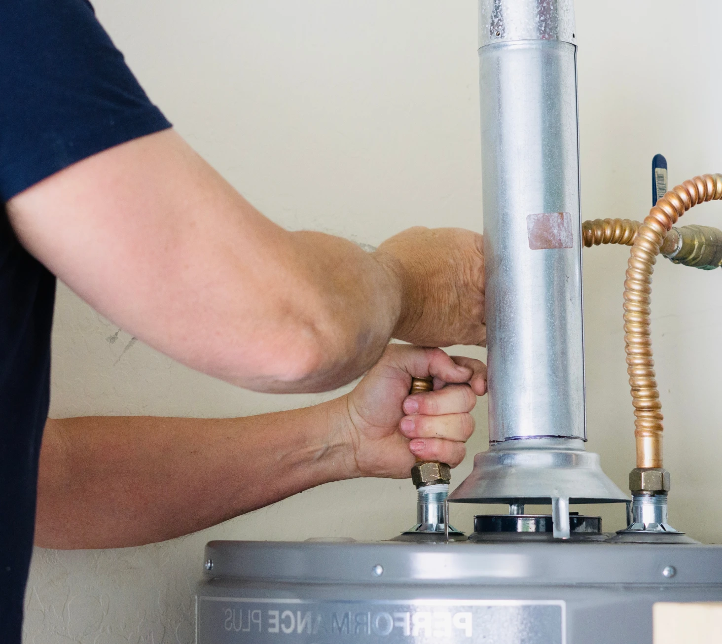heating technician repairing the furnace in Surrey